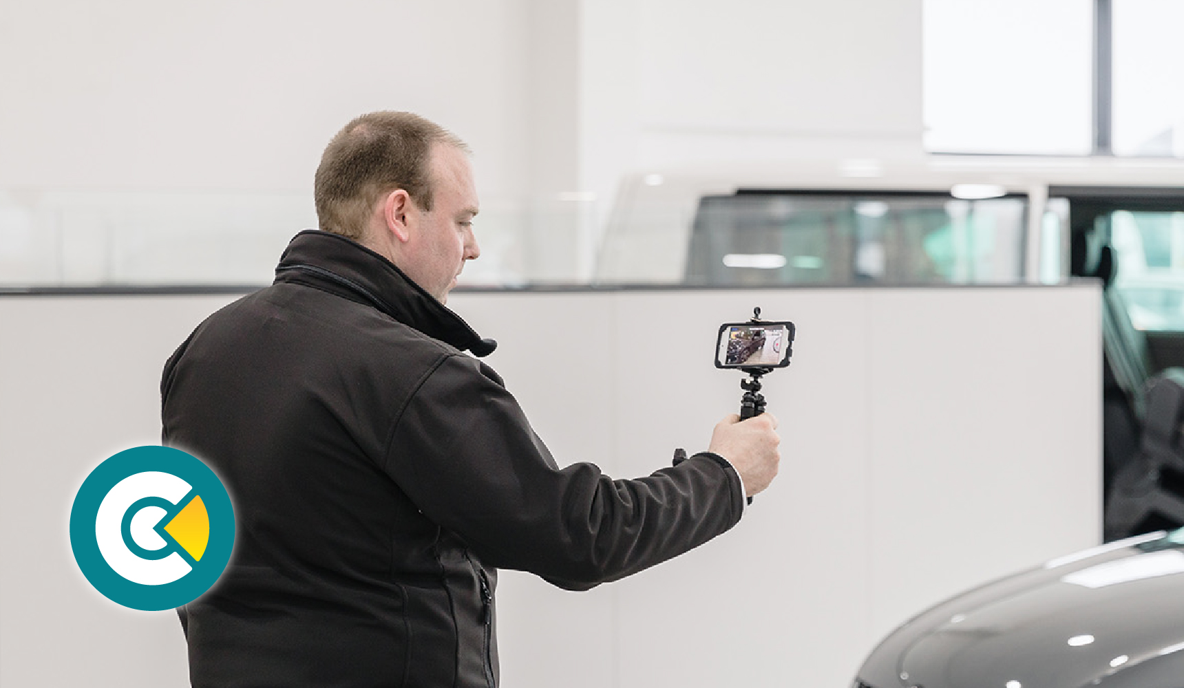 A salesman making a CitNOW Sales video in a dealership