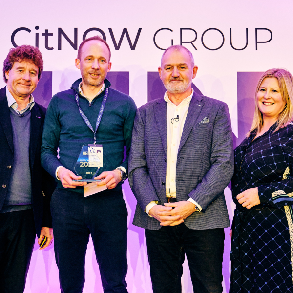 Geoffrey, Gordon and Carol presenting Ollie his award at the CitNOW Group Unify Conference